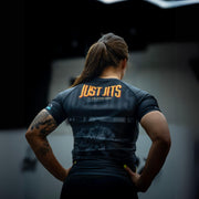 Elevate your No Gi game with the Just Jits Short Sleeve Rashguard - 8 Bit! Engineered for durability and performance in Brazilian Jiu Jitsu.