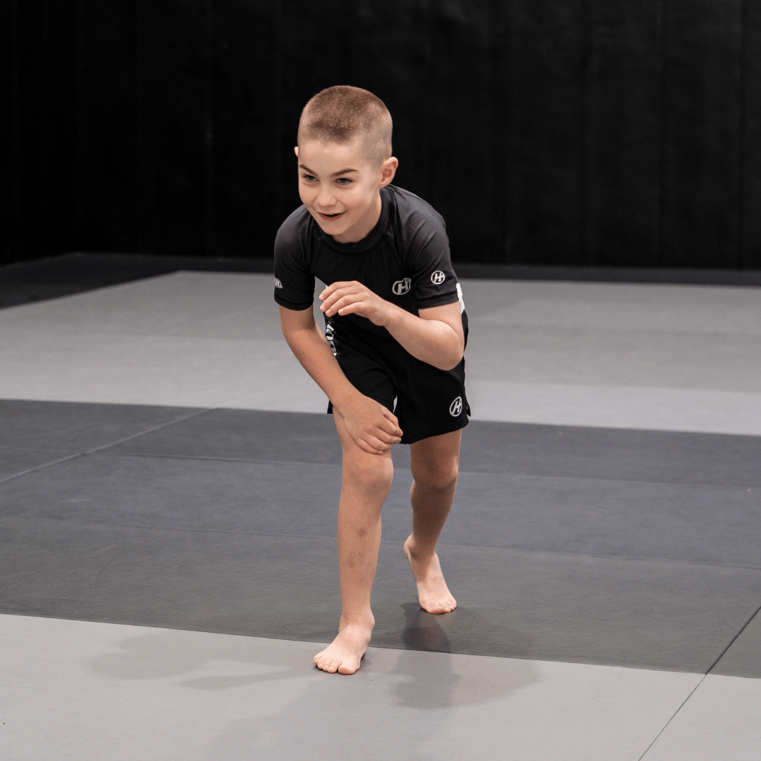 Hooks Pursuit BJJ kids rashguard when worn