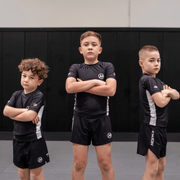 Hooks Pursuit BJJ kids rashguard and shorts when worn