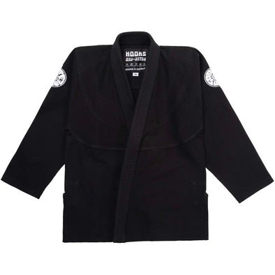 Black BJJ gi with ‘HOOKS JIU-JUTSU’ label, durable fabric, suitable for grappling and competitions.