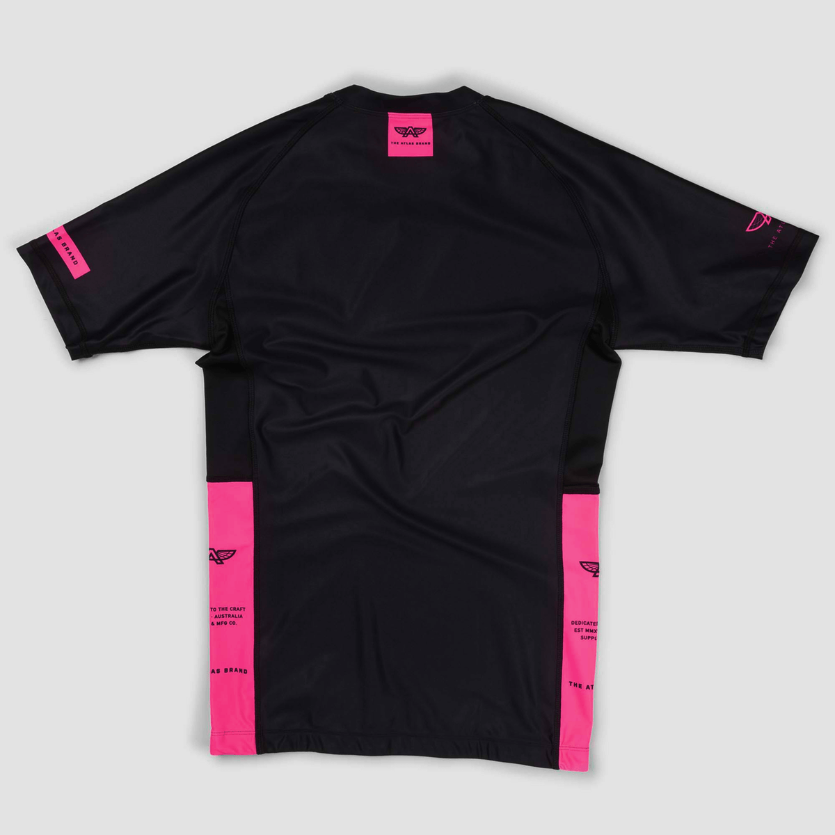 The Atlas Brand - Women's Apex S6 Eclipse Rash Guard flat lay