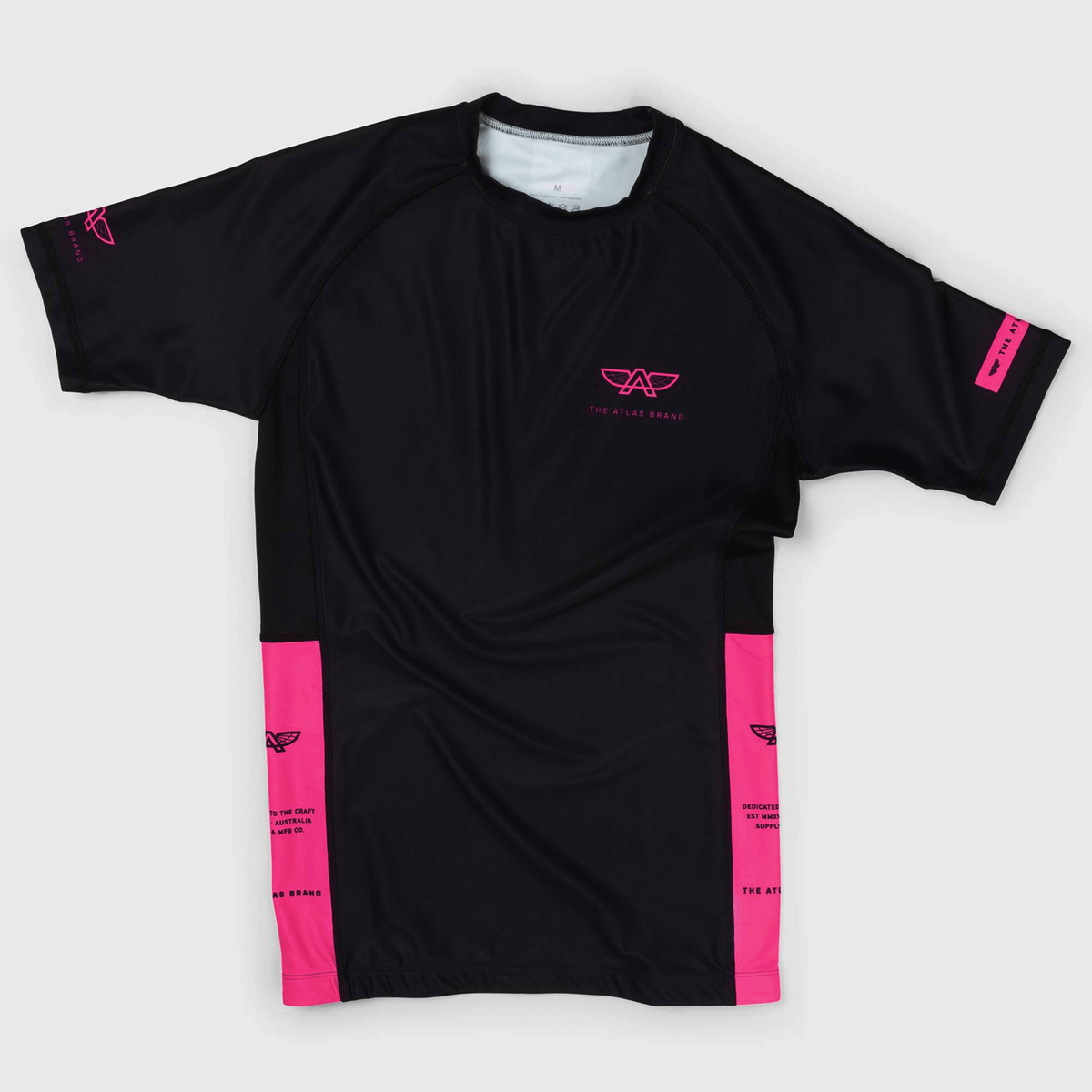 The Atlas Brand - Women's Apex S6 Eclipse Rash Guard flat lay