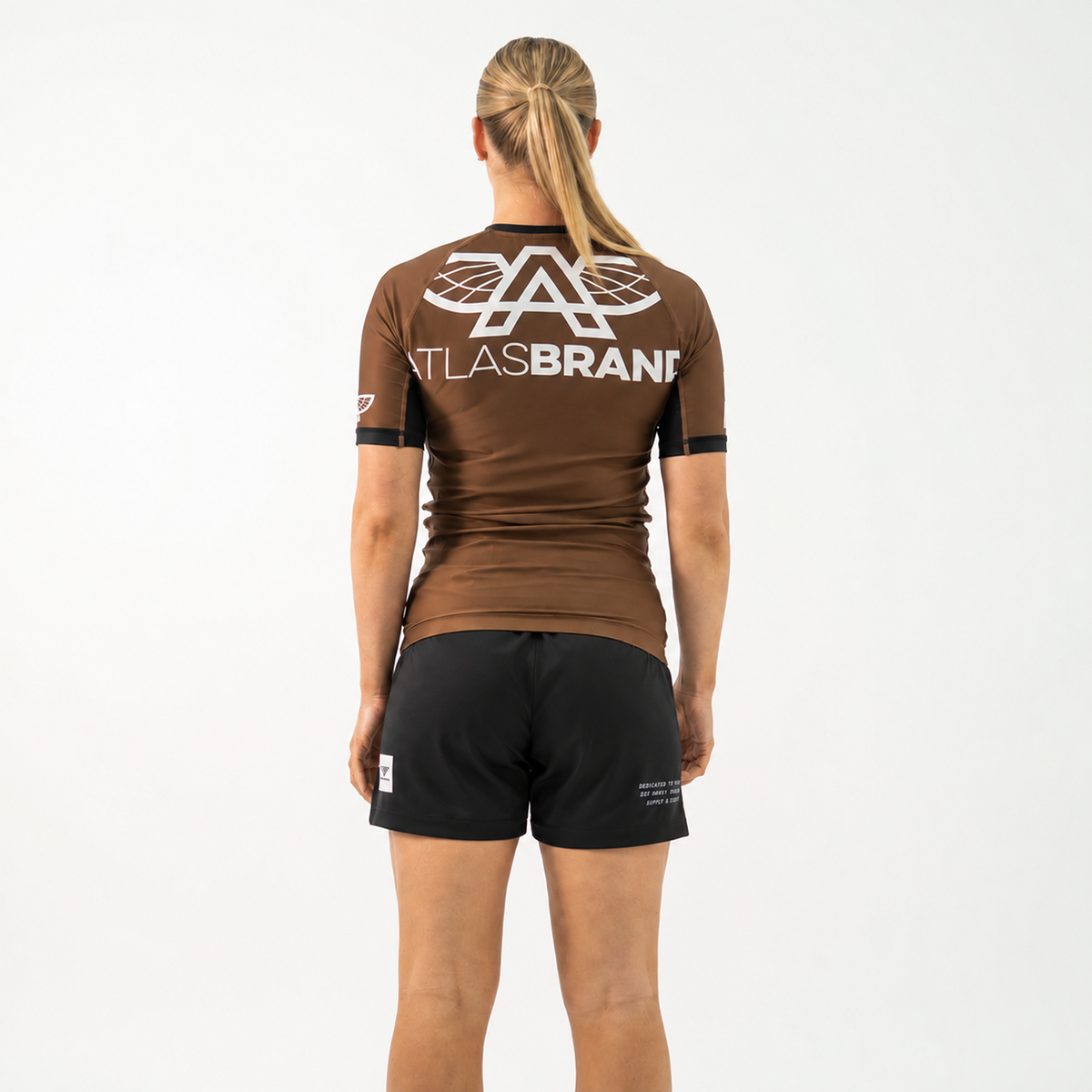 The Atlas Brand - Women's Ranked Rash Guard - Brown - loosened fit