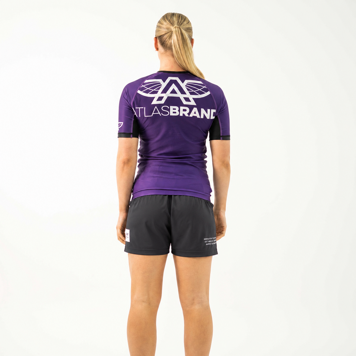 The Atlas Brand - Women's Ranked Rash Guard - Purple - loosened fit