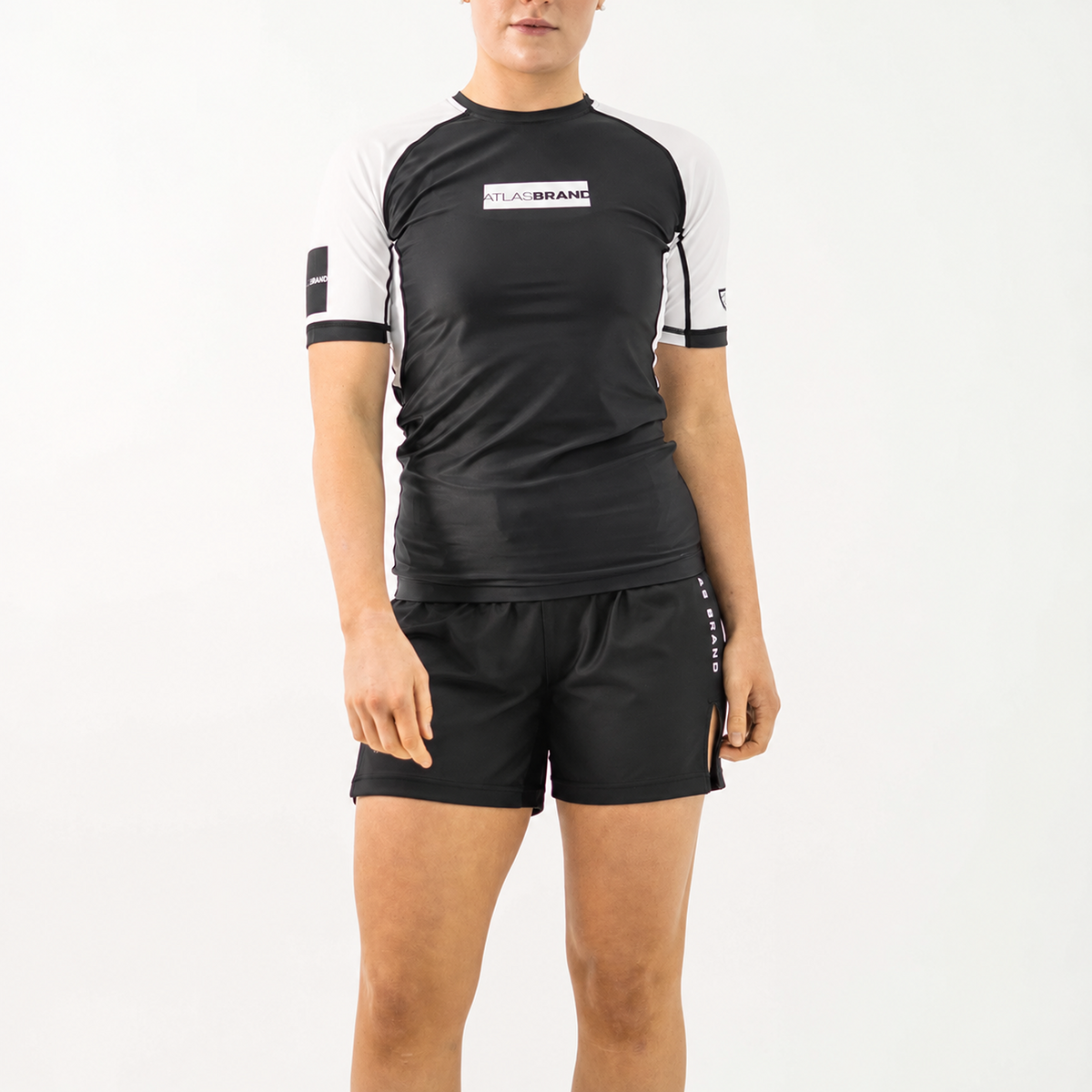 The Atlas Brand - Women's Ranked Rash Guard - White - loosened fit