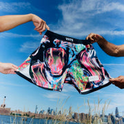 Stretch test of VHTS Trippy Tiger Series 2025 Combat Shorts Lucid, front design showing flexibility