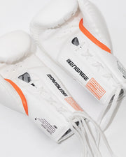 White boxing gloves with orange accents and 'Engage' branding on a white background