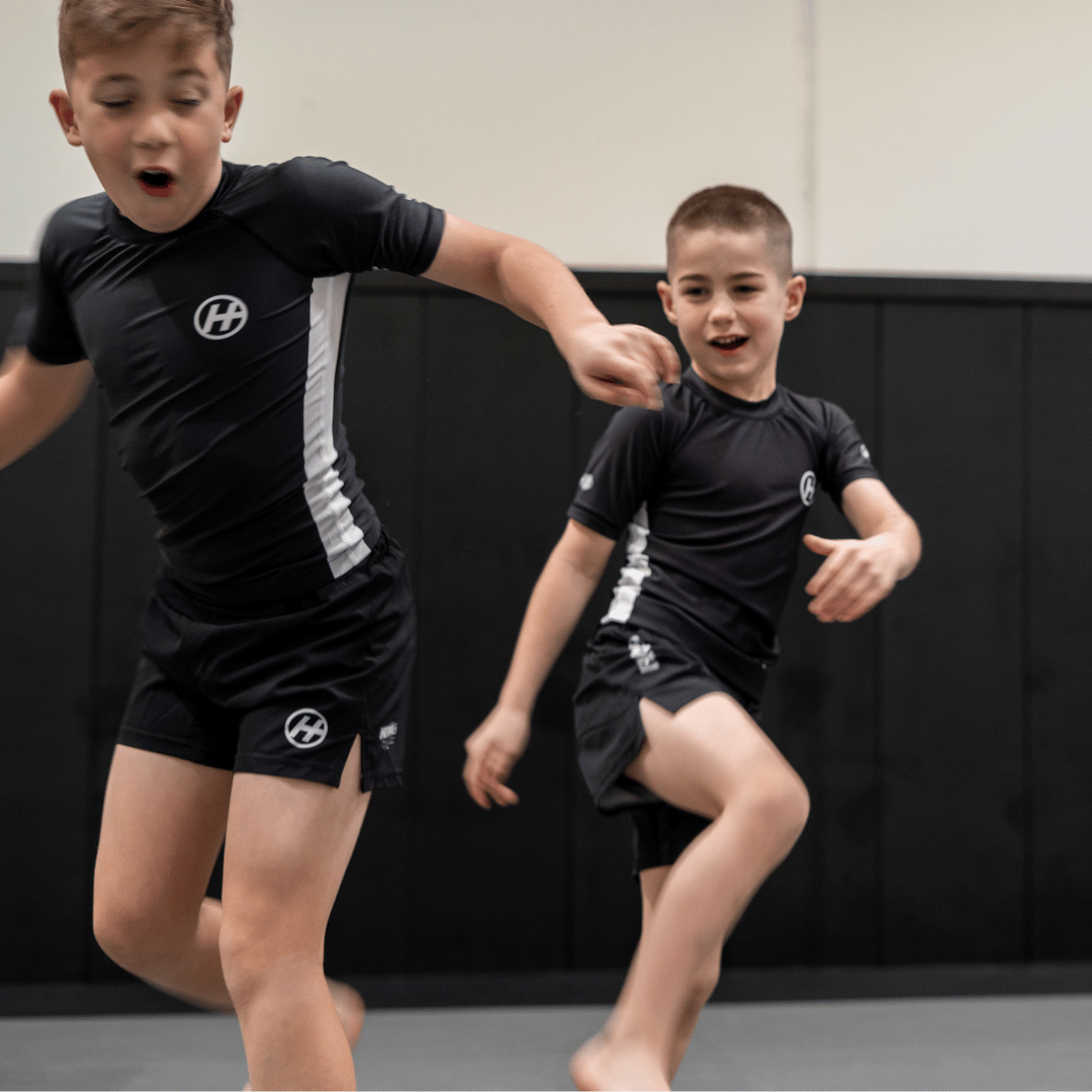 Hooks Pursuit BJJ kids rashguard and shorts when worn