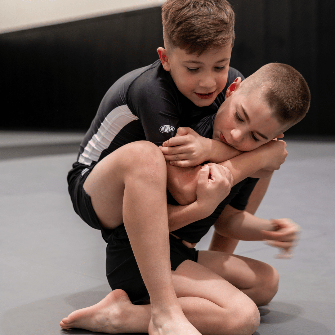 Hooks Pursuit BJJ kids rashguard when worn