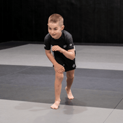 Hooks Pursuit BJJ kids rashguard when worn