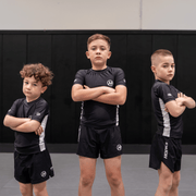 Hooks Pursuit BJJ kids rashguard and shorts when worn