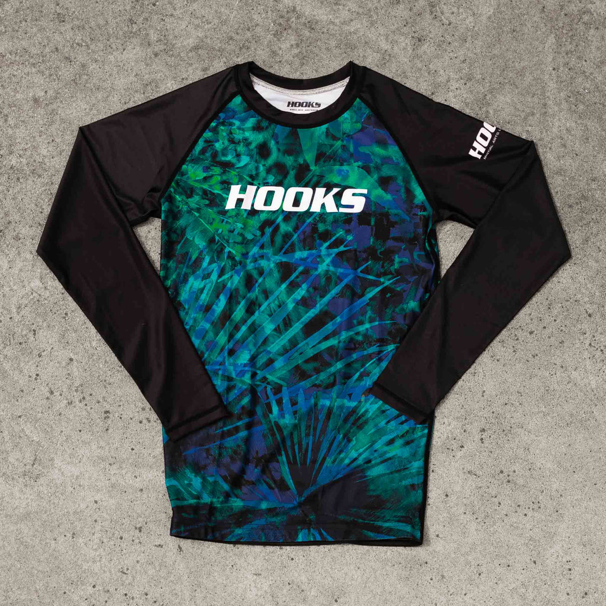 Hooks Women's Long Sleeve Rash Guard - Jungle Reign flat lay