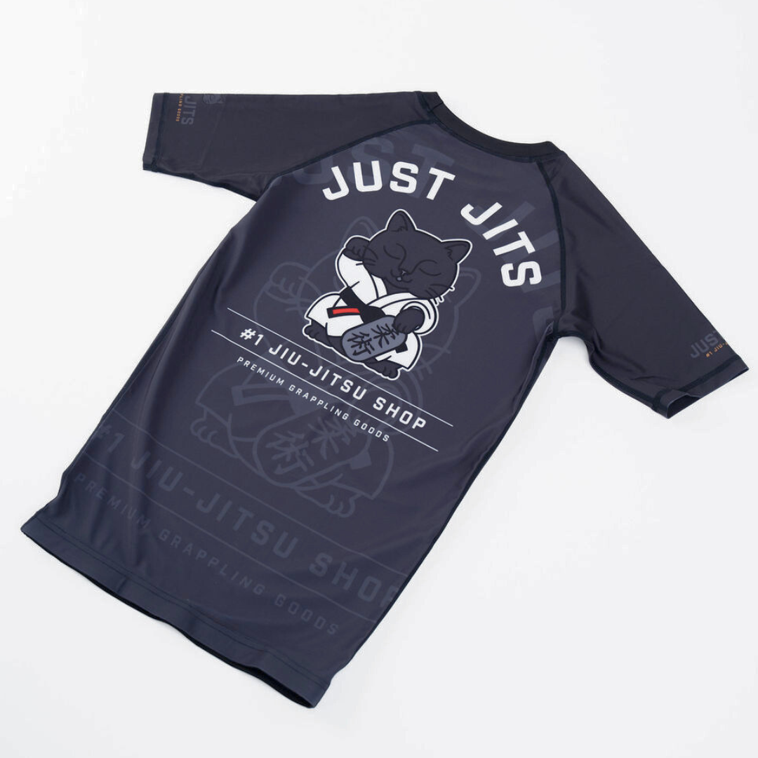 Just Jits - Women's Da Boss Rash Guard flat lay