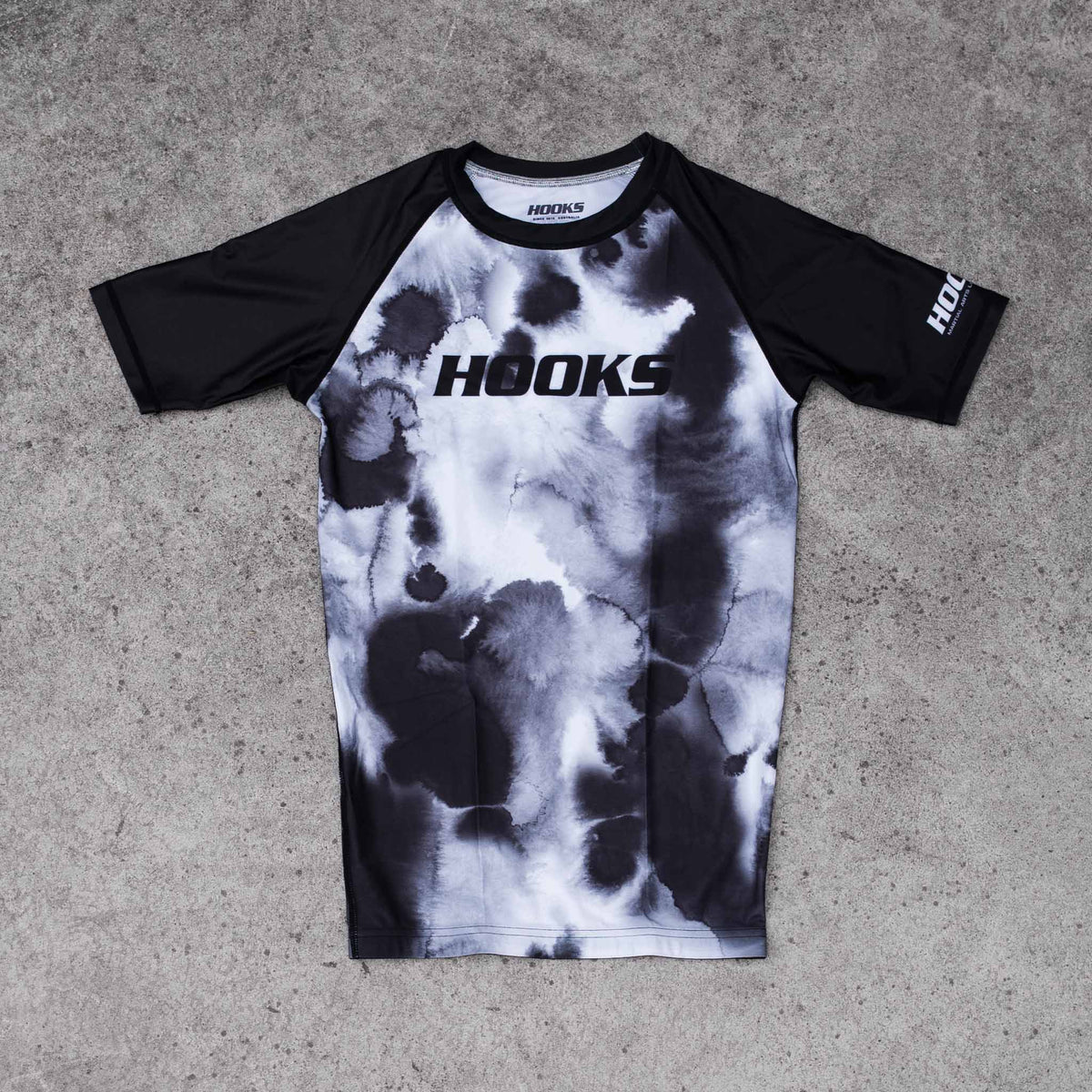 Hooks Women's Short Sleeve Rash Guard - Black Mist flat lay