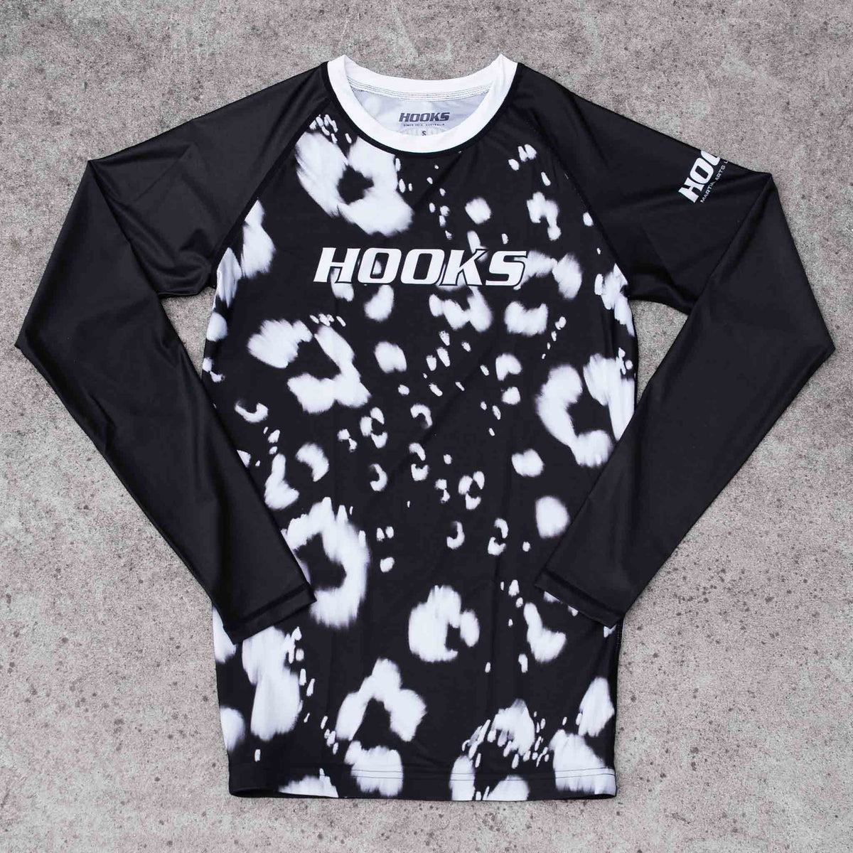 Hooks Women's Long Sleeve Rash Guard - Prowl flat lay