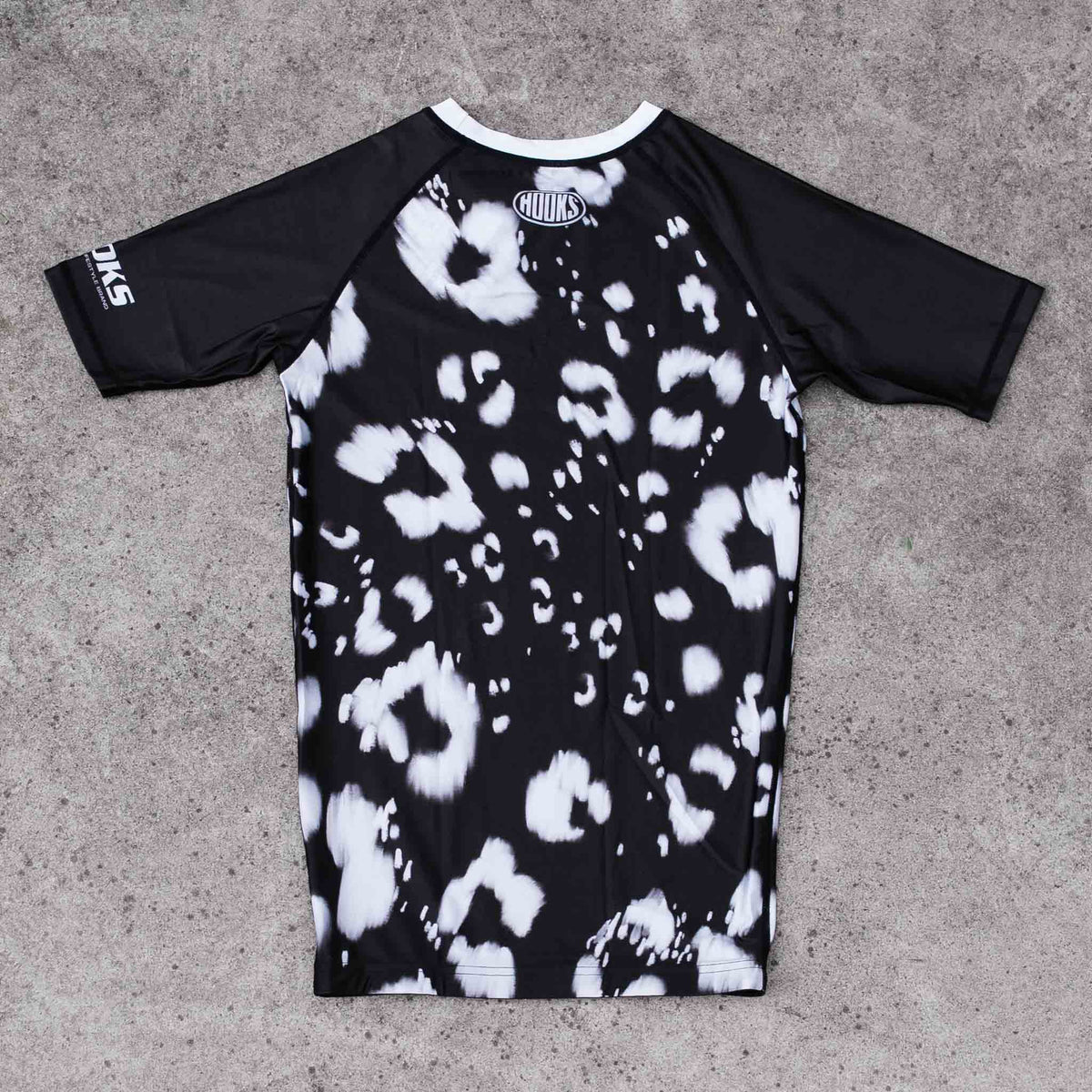 Hooks Women's Short Sleeve Rash Guard - Prowl flat lay
