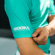 Hooks Teal Jiu Jitsu Rash Guard