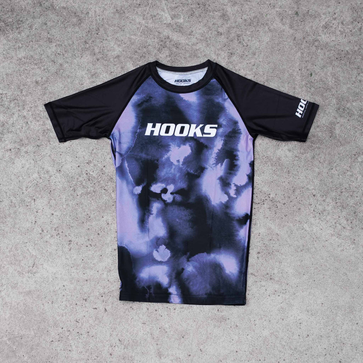 Hooks Women's Short Sleeve Rash Guard - Violet Haze flat lay