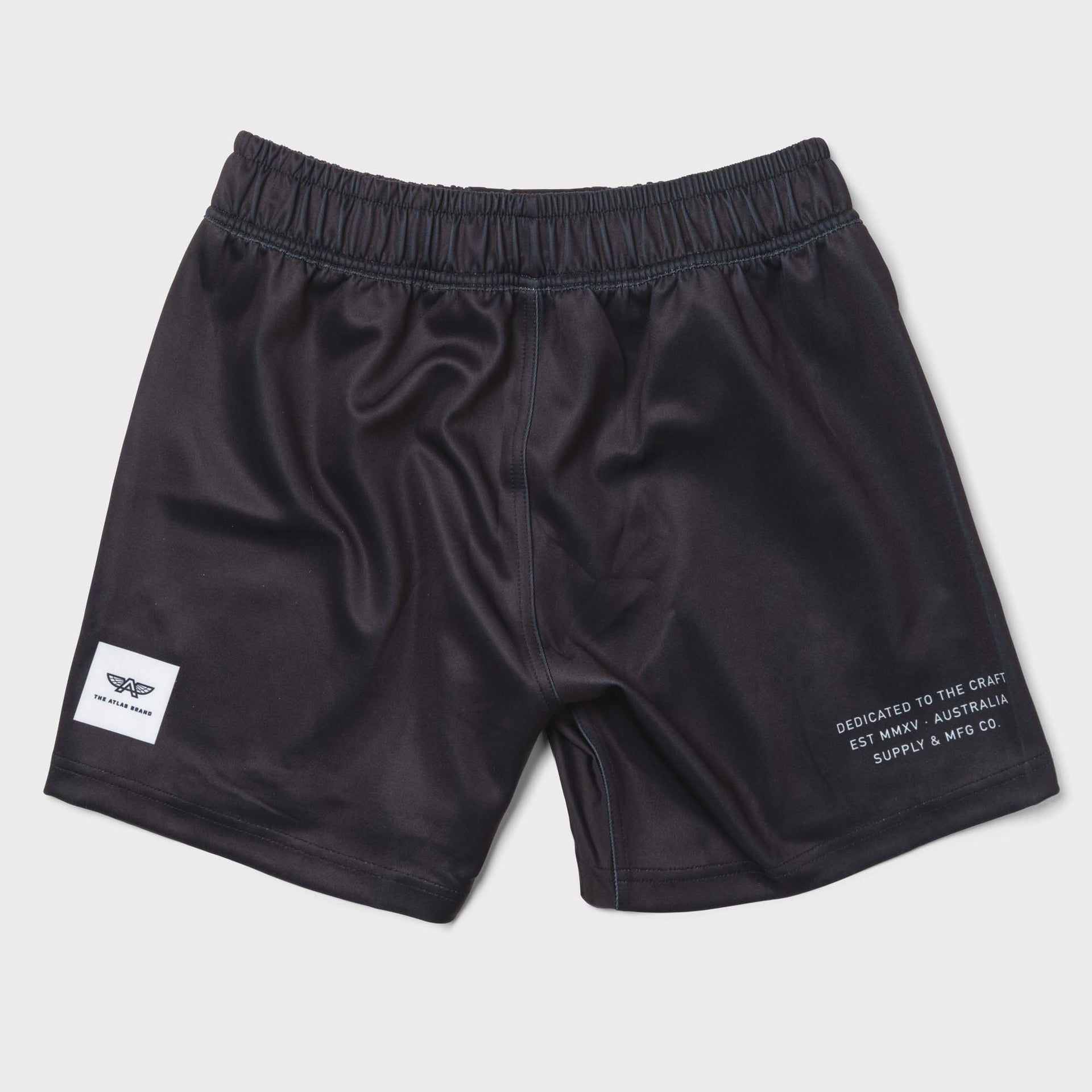 Atlas Brand AXIS Shorts in black, back view flat lay