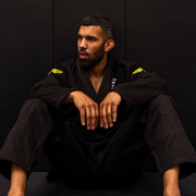 Whole body front view of The Atlas Brand ICON Black rashguard when worn.