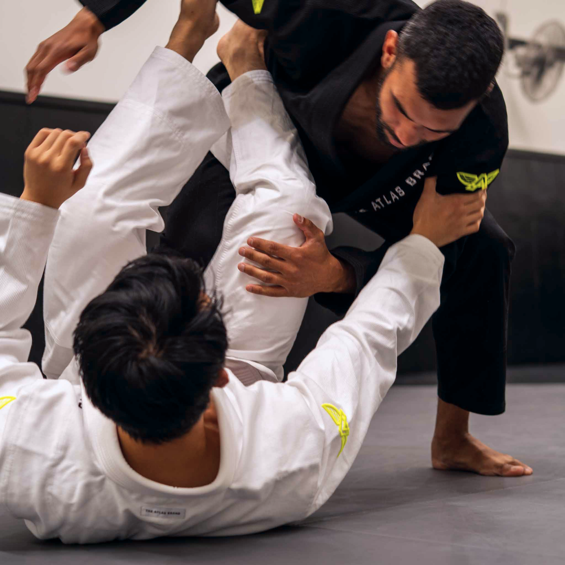 The Atlas Brand ICON White rashguard worn in action (2).