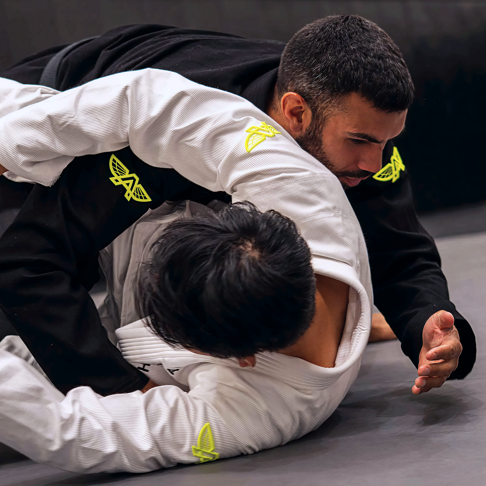 The Atlas Brand ICON White rashguard worn in action