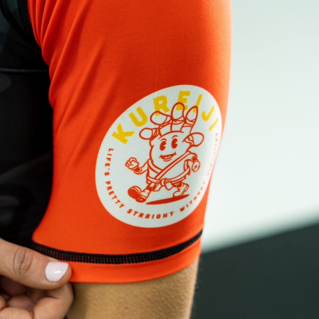 Sleeve detail close up of Kureiji Short Sleeve BJJ Rashguard Twistied Fingers Cheese other side