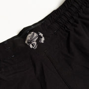 Close up of waistband print detail on Executioner BJJ Shorts