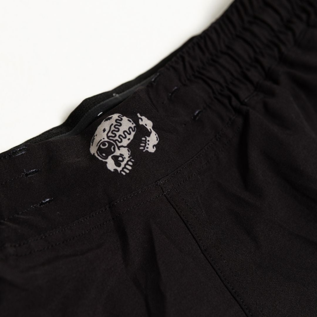 Close up of waistband print detail on Executioner BJJ Shorts
