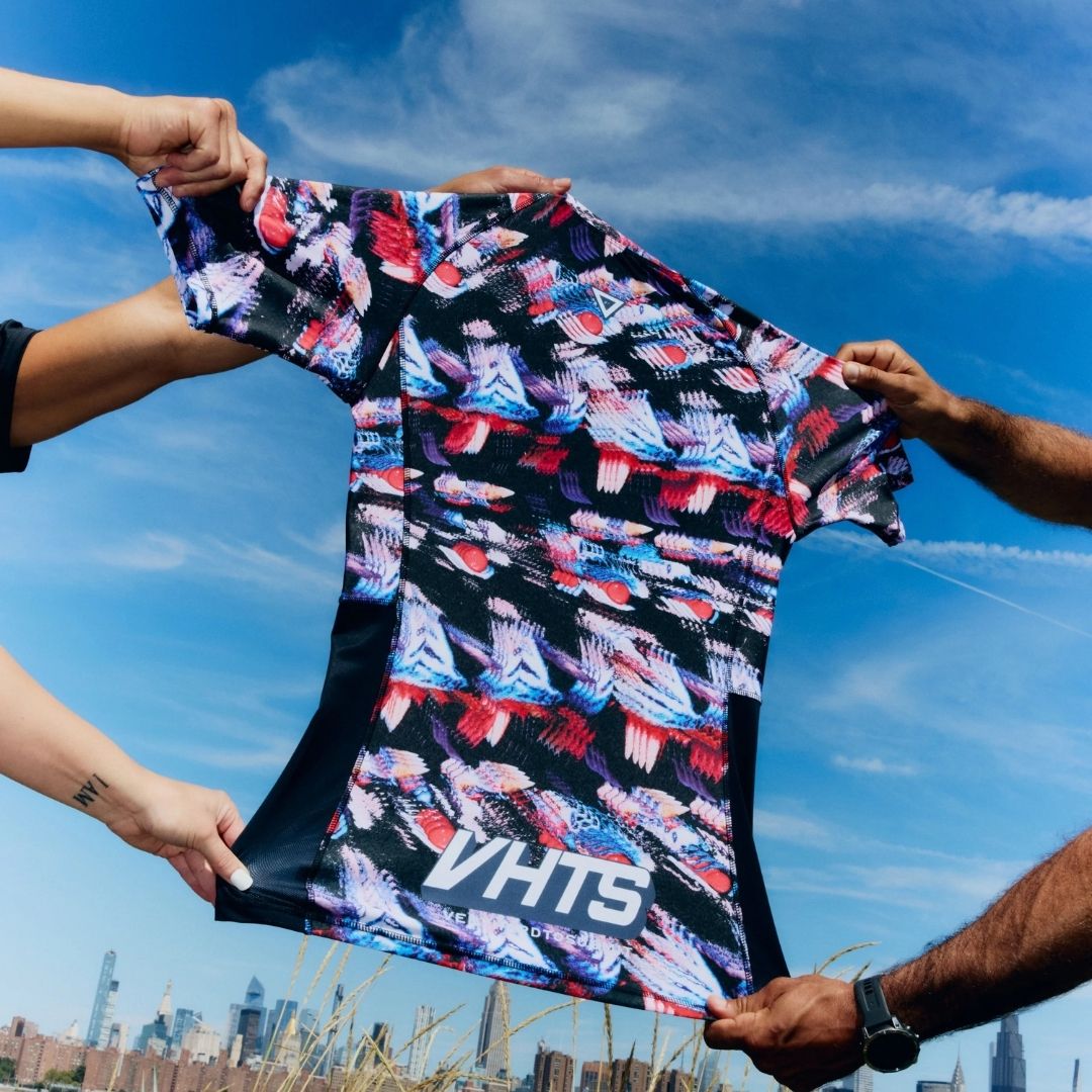 Stretch test of VHTS Trippy Tiger Series 2025 Rash Guard Iconoclast, back design highlighting durability