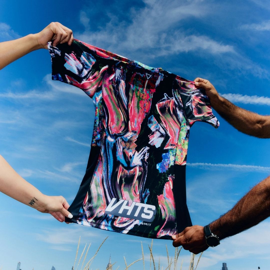 Stretch test of VHTS Trippy Tiger Series 2025 Rash Guard Lucid, back design highlighting durability