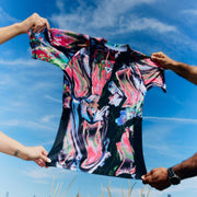 Stretch test of VHTS Trippy Tiger Series 2025 Rash Guard Lucid, front design showcasing flexibility