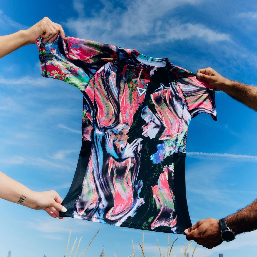 Stretch test of VHTS Trippy Tiger Series 2025 Rash Guard Lucid, front design showcasing flexibility